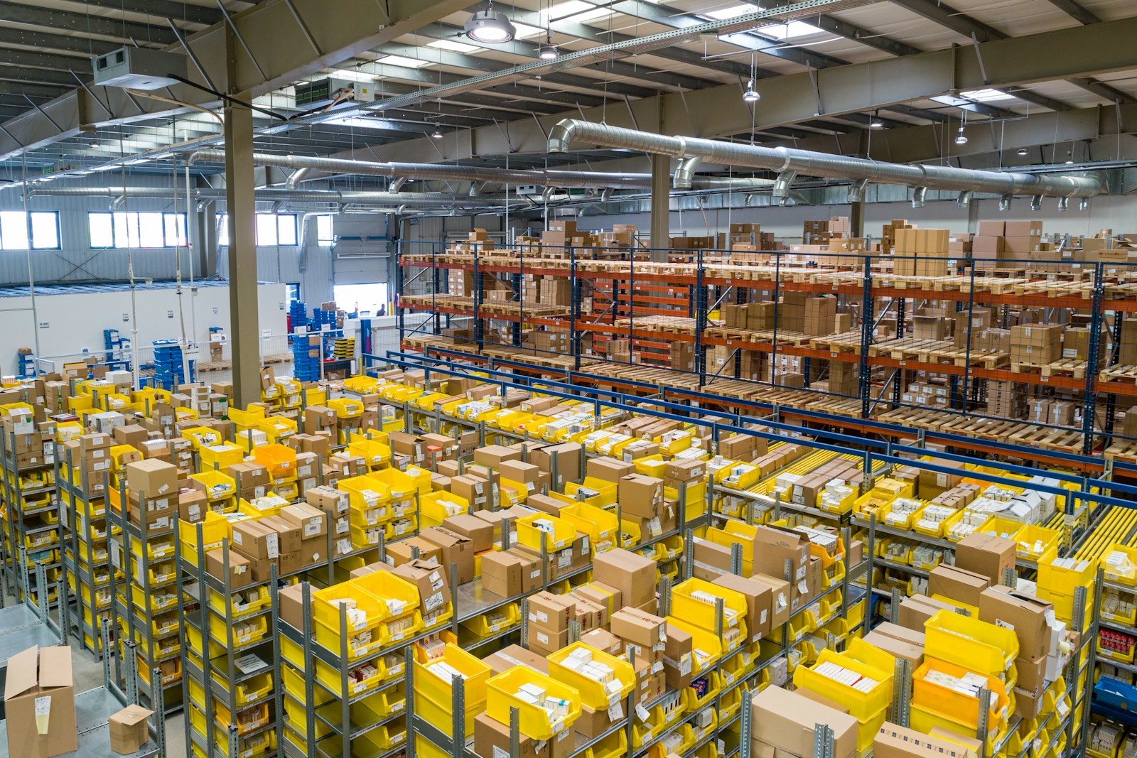 Warehouse and industrial storage — pulp and paper logistics and water context. Photo via Unsplash.