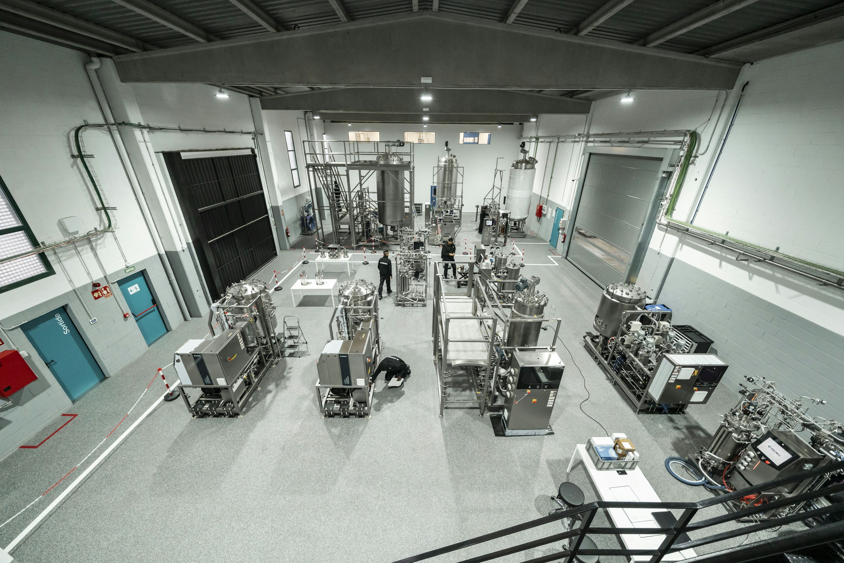 Stainless food processing lines with hygienic tanks — F&B effluent context. Photo: TECNIC Bioprocess Solutions on Unsplash.